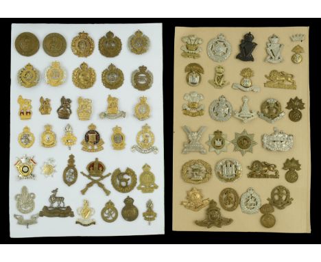 British Cap Badges. A good selection of British Cap Badges across two cards, including Royal Dublin Fusiliers, The Rifle Brig