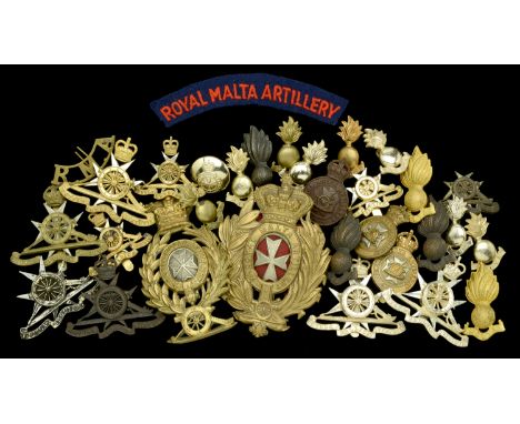 Royal Malta Artillery Helmet Plates and Cap Badges. A good and scarce selection of Royal Malta Artillery Helmet Plates and Ca