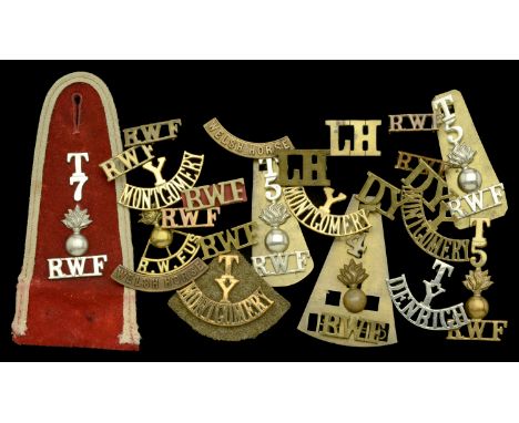 Welsh Regimental Shoulder Titles. A selection of Welsh regimental shoulder titles to include, a scarce Royal Welsh Fusiliers 