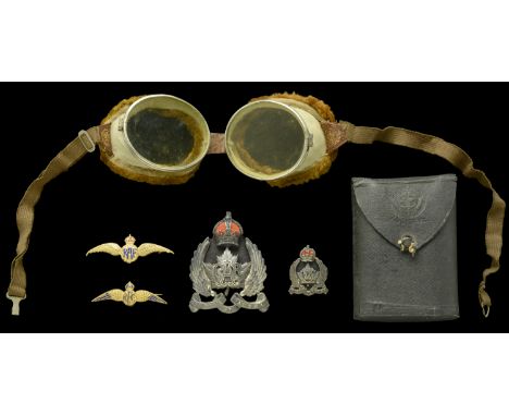 Early Royal Air Force Insignia. An interesting aviation insignia and artefact group consisting of a Canadian Cap & Collar Bad