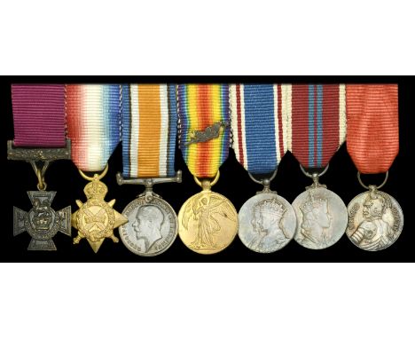 The mounted group of seven miniature dress medals representative of those worn by Private G. Stringer, Manchester Regiment  V