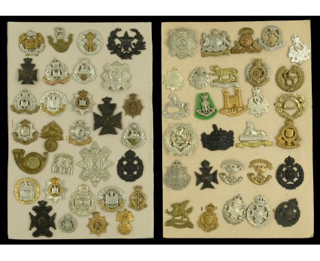 British Cap Badges. A good selection of British Cap Badges, including some Victorian examples across two cards, including Dev