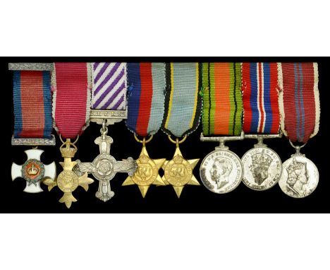 The mounted group of eight miniature dress medals attributed to/ representative of those worn by Wing Commander R. E. Bailey,