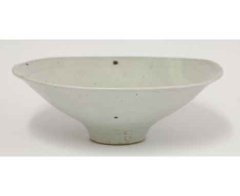 A stoneware bowl,by Bernard Leach (1887-1979) St. Ives Pottery, in a celadon glaze, impressed seal mark, restored,23.5cm diam