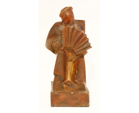 A figure of a man playing an accordian,in the style of Martel Frères,37.5cm high