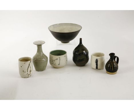 Seven studio ceramic items,an ewer, impressed 'P2P',a vase, incised 'Jill Pryke',two vases, incised 'Yoko', with Sotheby's la