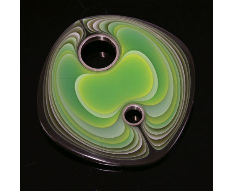 A sterling silver and polyester resin pendant, c.1972,by Jan and Ted Arundell, rounded cushion form with varicoloured green l