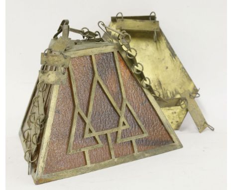 An Art Deco brass pyramid and amber glass ceiling light,each axis with geometric cut panels held on a chain-link suspension,2