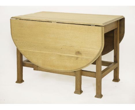 An Arts & Crafts light oak gateleg table,with a moulded edge,104cm wide165cm open