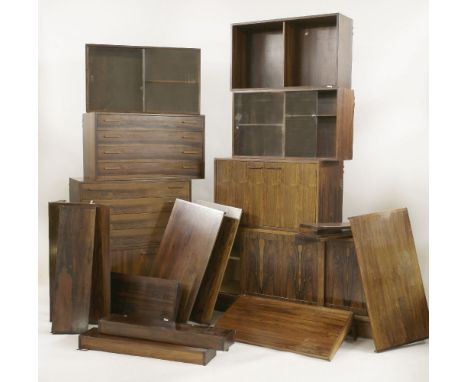 A Danish rosewood FM-Reolsystem wall unit,designed by Kai Kristiansen, comprising:nine shelves,three glazed cupboards,one wit