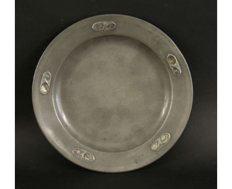 A Tudric pewter dish,designed by Archibald Knox for Liberty, mounted with abalone shells impressed '109 Tudric',24cm diameter