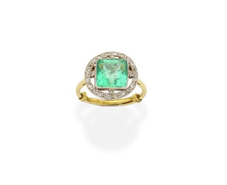 EMERALD AND DIAMOND RING, FIRST QUARTER OF TWENTIETH CENTURYThe square-cut emerald within an openwork surround set with singl