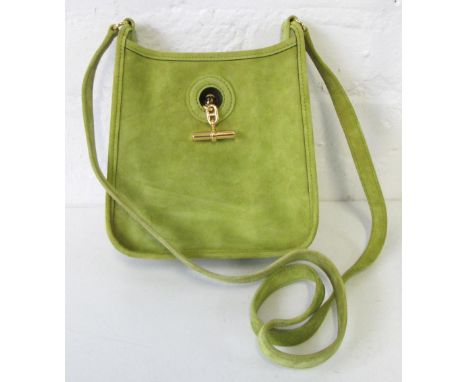 HERMES MINI VESPA, in lime green suede with gilt hardware, date mark for 2004, 18cm x 20cm and dust bag.