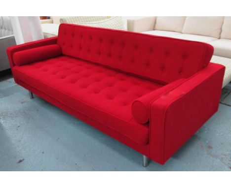 FLORENCE KNOLL SOFA, large two seater, in red velvet on tubular supports with two bolster cushions, 215cm L.