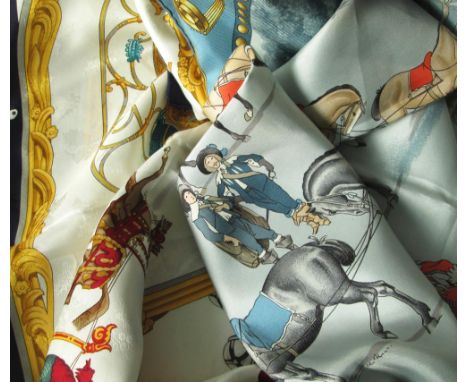HERMES SILK SCARVES, two, 'Presentation de Chevaux' and 'Plumes et Grelots', each 86cm x 86cm. (2)