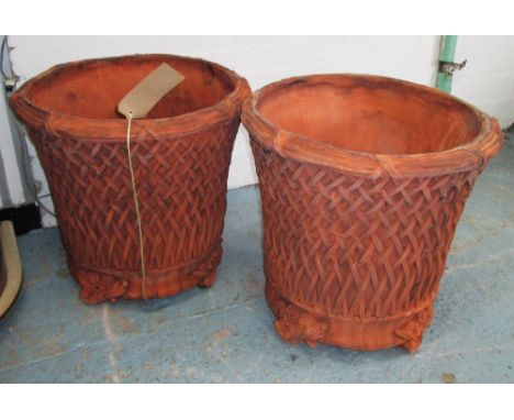 GARDEN PLANTER URNS, a pair, 19th century terracotta basket style weathered finish, 54cm H x 54cm. (2)