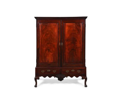 A GEORGE II MAHOGANY CLOTHES PRESS IRISH, MID 18TH CENTURY Of compact proportions 169cm high, 131cm wide, 64cm deep  Provenan