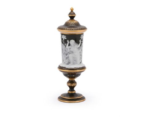 A MINTON PÂTE SUR PÂTE BROWN GROUND URN AND COVER BY MARC-LOUIS SOLON, LATE 19TH CENTURY Carved in low relief in the round wi