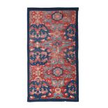 AN USHAK OR SMYRNA CARPET FRAGMENT, LATE 17TH OR EARLY 18TH CENTURY