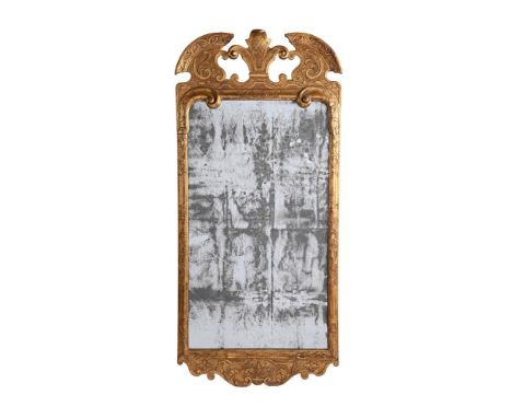 A GEORGE I GILT GESSO MIRROR IN THE MANNER OF JOHN BELCHIER, CIRCA 1720 123cm high, 56.5cm wideSee Christopher Gilbert, Marke