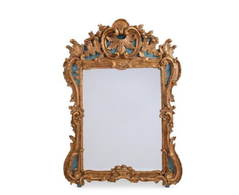 A LARGE CONTINENTAL CARVED GILTWOOD MIRROR PROBABLY FRENCH, 18TH OR EARLY 19TH CENTURY 140cm high, 100cm wide  Condition Repo