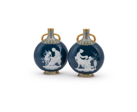 A FINE PAIR OF MINTON PÂTE SUR PÂTE MOON FLASKS BY MARC-LOUIS SOLON, LATE 19TH OR EARLY 20TH CENTURY  Each of moon flask or p