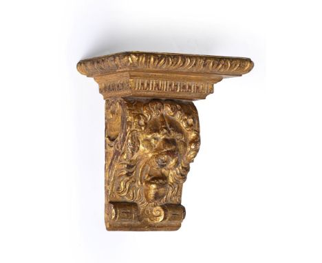 A GEORGE II CARVED GILTWOOD WALL BRACKET IN THE MANNER OF WILLIAM KENT, CIRCA 1750 25cm high, 24cm wide, 14cm deep