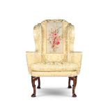 A GEORGE I WALNUT WING ARMCHAIR, CIRCA 1720