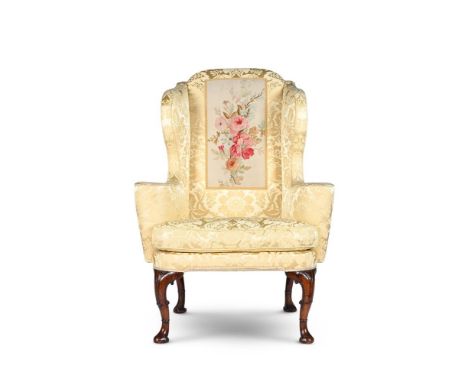 A GEORGE I WALNUT WING ARMCHAIR CIRCA 1720 Upholstered in damask, inset with a section of Aubusson tapestry 117cm high, 85cm 