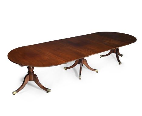 A GEORGE III MAHOGANY TRIPLE PEDESTAL EXTENDING DINING TABLE CIRCA 1800 With two additional leaf insertions 74.5cm high, 360c