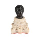 A SMALL BRONZE OF A BOY'S HEAD, POSSIBLY ROMAN