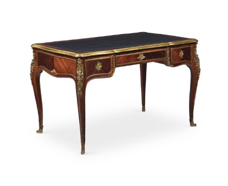 Y A ROSEWOOD, MAHOGANY AND GILT METAL MOUNTED BUREAU PLAT IN LOUIS XV STYLE, LATE 19TH OR EARLY 20TH CENTURY With three friez