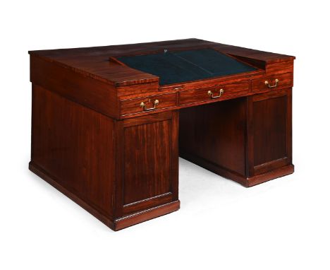 A REGENCY MAHOGANY PEDESTAL PARTNER'S DESK CIRCA 1815 With solid ash drawer linings, The frieze drawers above one cupboard do