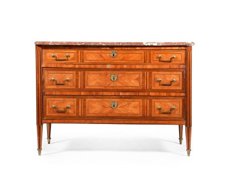 A LOUIS XVI WALNUT AND PARQUETRY DECORATED COMMODE LATE 18TH CENTURY With a shaped rouge griotte marble top 91cm high, 126.5c