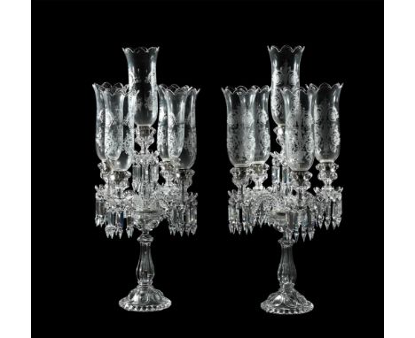 A PAIR OF BACCARAT PRESS MOULDED GLASS CANDELABRA MODERN With acid-etched storm shades each 83cm high  Condition Report:  No 