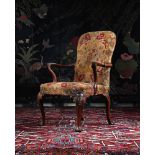 A GEORGE I WALNUT AND NEEDLEWORK UPHOLSTERED ARMCHAIR, IN THE MANNER OF GILES GRENDEY, CIRCA 1720