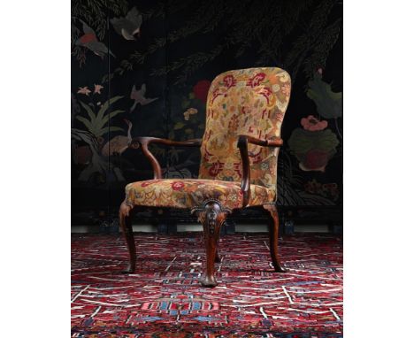 A GEORGE I WALNUT AND NEEDLEWORK UPHOLSTERED ARMCHAIR IN THE MANNER OF GILES GRENDEY, CIRCA 1720 100cm high, 77cm wide, 63cm 