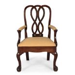 A GEORGE II CARVED MAHOGANY ARMCHAIR, IRISH, CIRCA 1745