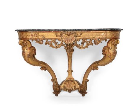 A RÉGENCE CARVED GILTWOOD CONSOLE TABLE CIRCA 1720 79cm high, 115cm wide, 55cm deep  For a similar console table of the perio