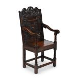 AN OAK PANEL BACK ARMCHAIR, WESTMORLAND, LAKE DISTRICT, MID 17TH CENTURY