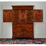 A GEORGE I BURR WALNUT AND WALNUT CABINET ON CHEST, CIRCA 1720