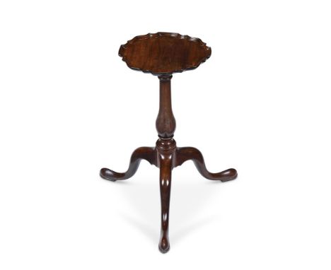 A GEORGE III MAHOGANY CANDLESTAND CIRCA 1760 The underside of the piecrust carved top with a paper label inscribed 'rare Chip