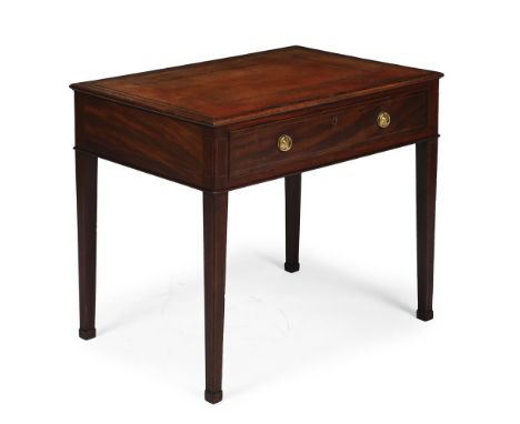 A GEORGE III MAHOGANY WRITING OR LIBRARY TABLE CIRCA 1800 With a gilt tooled leather top and a secretaire drawer opposing a f