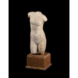 A SMALL ROMAN MARBLE TORSO OF APHRODITE, CIRCA 2ND CENTURY A.D.