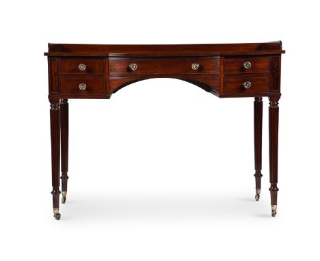 A REGENCY MAHOGANY DRESSING TABLE BY GILLOWS, CIRCA 1815 The central drawer stamped GILLOWS LANCASTER, with concave shaped ce