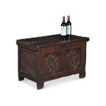 AN UNUSUAL SMALL CHARLES I CARVED AND PANELLED OAK CHEST OR COFFER, POSSIBLY GLOUCESTERSHIRE
