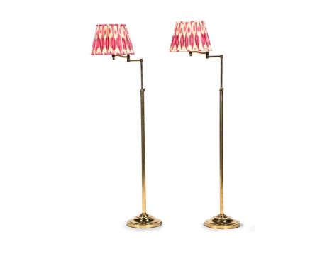 A BRASS OF BRASS ADJUSTABLE STANDARD LAMPS  20TH CENTURY  Height adjustable and the further pivoting arm also adjusting the a