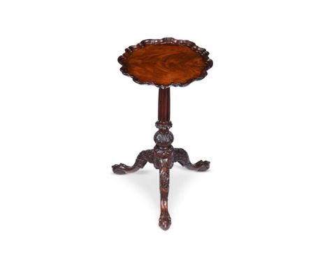 A GEORGE III CARVED MAHOGANY CANDLESTAND CIRCA 1770 55cm high, the 'pie crust' top 30cm diameter  Condition Report:  Overall 