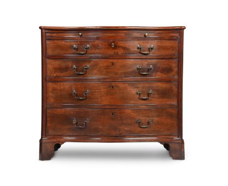 A GEORGE III MAHOGANY SERPENTINE FRONTED CHEST OF DRAWERS CIRCA 1780 With a slide, oak lined drawers and stop-fluted pilaster
