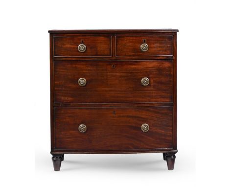 A SMALL REGENCY MAHOGANY BOWFRONT CHEST OF DRAWERS CIRCA 1820 84.5cm high, 77cm wide, 47cm deep  Condition Report:  Marks, kn